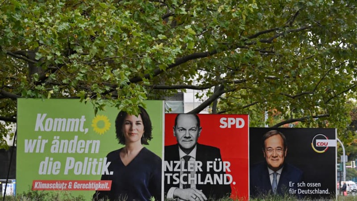 Allemagne: affiches de campagne pour les élections législatives montrant les trois candidats à la chancellerie Olaf Scholz (SPD), Armin Laschet (CDU) et Annalena Baerbock (Les Verts) - John Macdougall / AFP Allemagne: affiches de campagne pour les élections législatives montrant les trois candidats à la chancellerie Olaf Scholz (SPD), Armin Laschet (CDU) et Annalena Baerbock (Les Verts) - John Macdougall / AFP