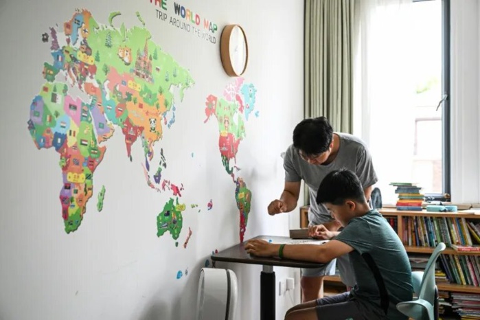 Chine : Profession « père au foyer » Chine : Profession « père au foyer »