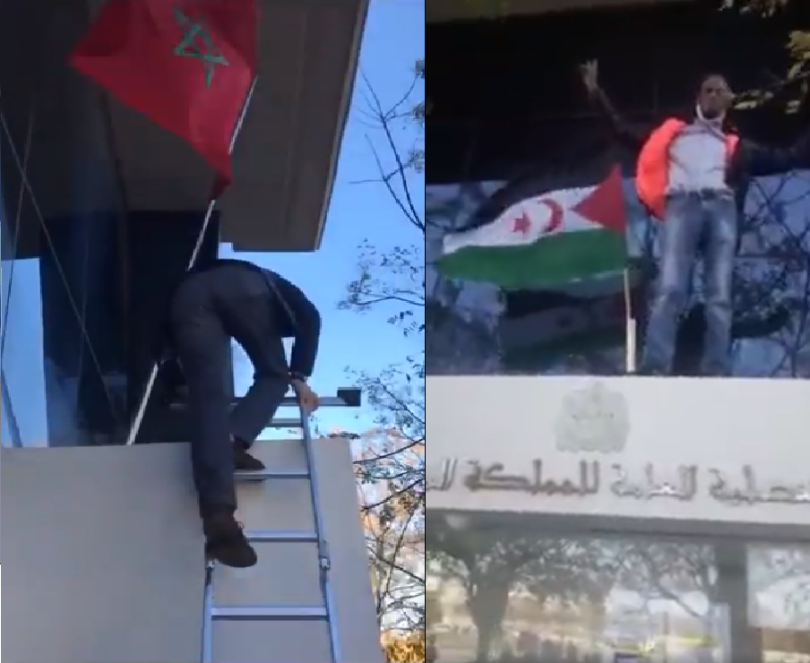 Photo montrant la tentative des pro-polisariens pour placer leur drapeau sur le bâtiment du Consulat marocain à Valence et l'intervention du Consul marocain qui a remis le drapeau national à sa place.