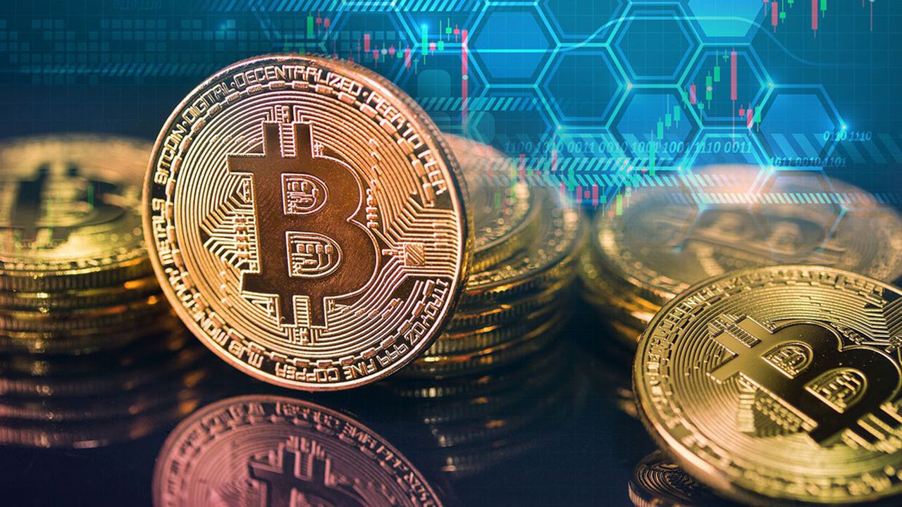 Le Bitcoin atteint un nouveau record de plus de 61.000 Dollars