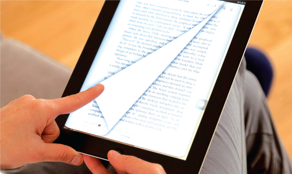 Une liseuse qui tourne les pages du livre numérique