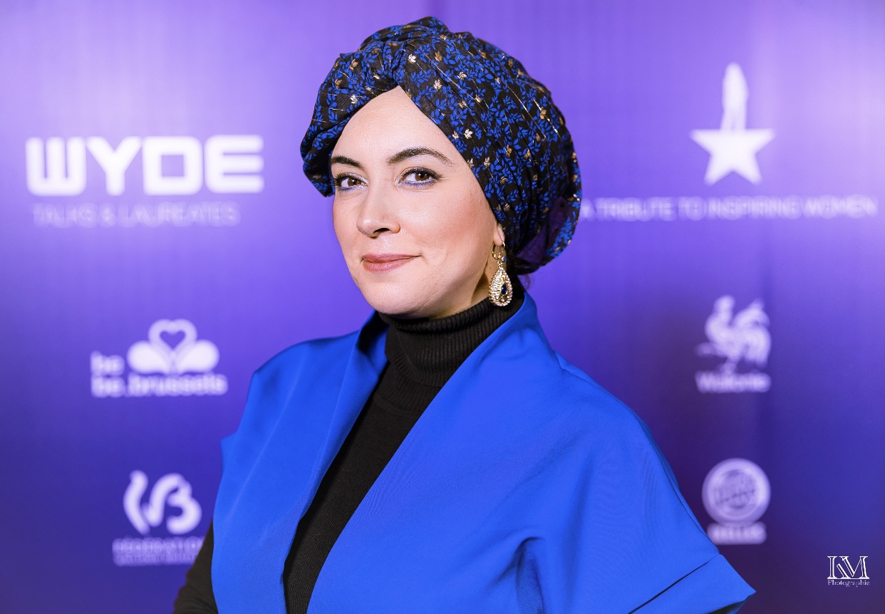 (c) Karema Menassar